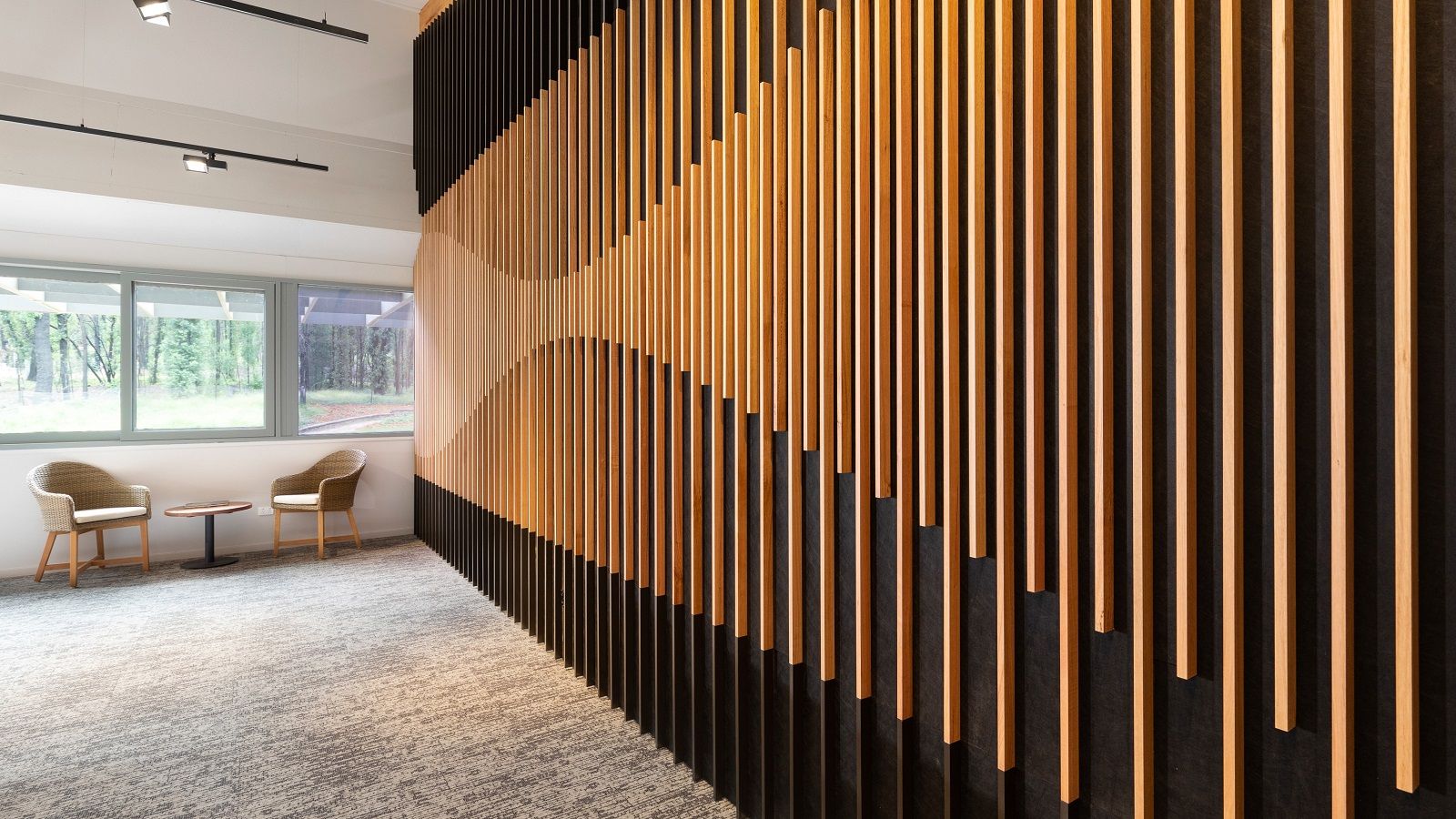 Wooden panel feature wall inside the Banksia conference room at the Botanic Garden. banner image