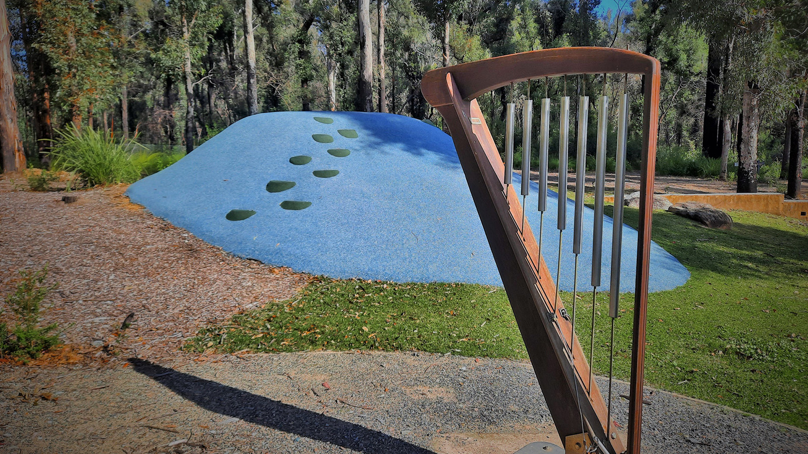 Image A large wooden and metal xylophone outdoor instrument