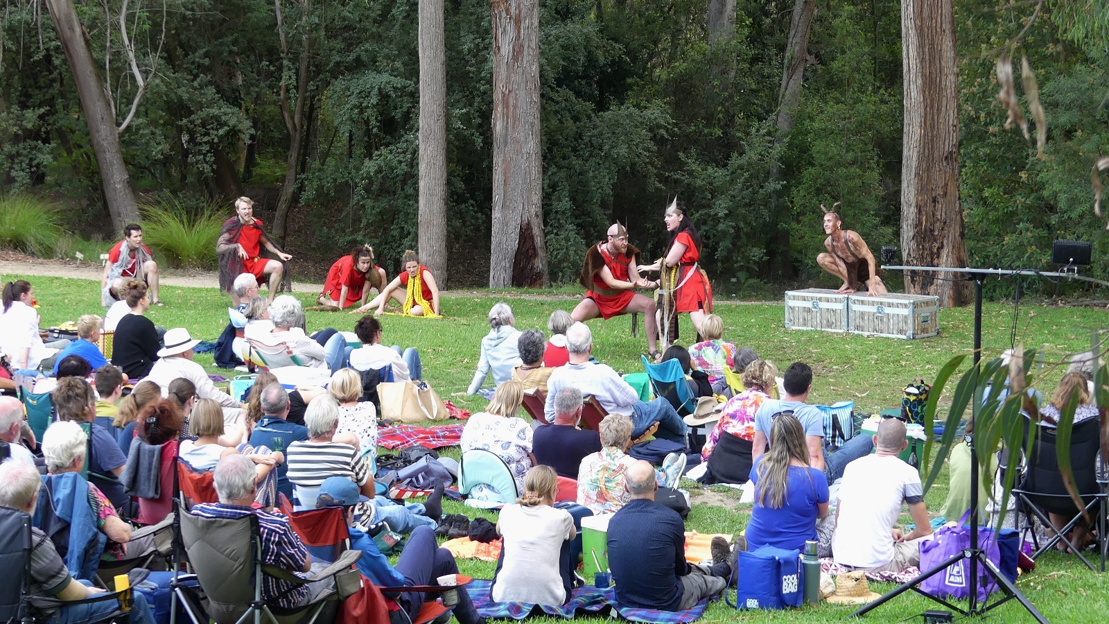 People: Crowd watching theatre performance